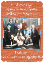 Front of a humorous birthday greeting card featuring a vintage photograph of a large, eccentric family with quirky expressions. The text on the card reads: "My doctor asked if anyone in my family suffers from insanity... I said no - we all seem to be enjoying it."