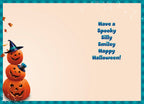 Inside of a greeting card with the message 'Have a Spooky Silly Smiley Happy Halloween!' in bold blue text, featuring a partial view of the stacked pumpkin design and teal plaid border.