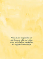 Interior of a Cute Halloween greeting card with a warm yellow watercolor background, featuring a printed message: 'When there's magic in the air and the moon is big and bright, you're wished all the spooky fun of a happy Halloween night!'