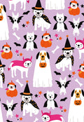 Cute Halloween greeting card featuring a repeating pattern of cartoon dogs dressed in various costumes like ghosts, witches, vampires, and devils, alongside pumpkins, bats, and stars on a light purple background. Perfect for sending festive wishes.