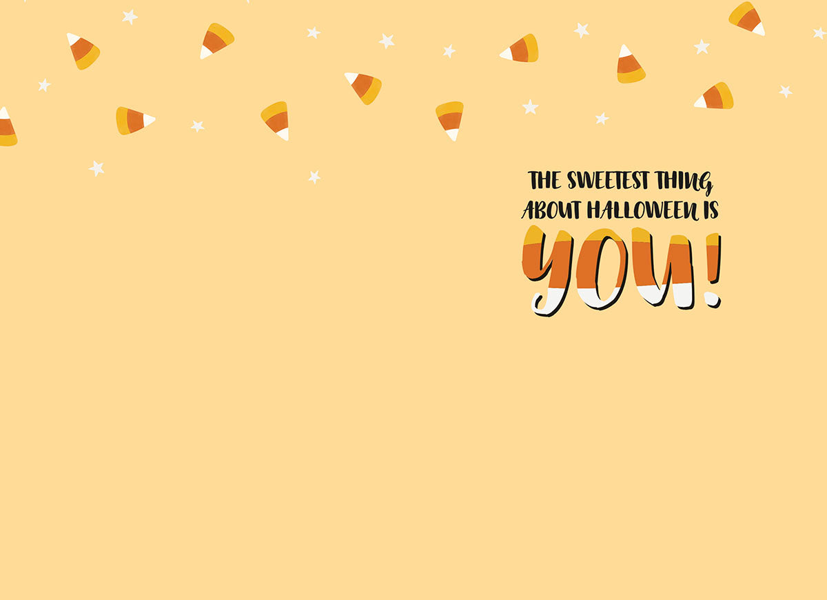 Inside view of a cute greeting card with a warm, light yellow background. A border of candy corn and small white stars decorates the top edge. The heartfelt message 'THE SWEETEST THING ABOUT HALLOWEEN IS YOU!' is printed in a charming black and orange font, making it ideal for expressing affection.