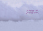 Inside of a spooky cute greeting card with a light purple and grey cloud-like background, featuring the message '...just dropping by to wish you a happy Halloween!' in whimsical purple script.