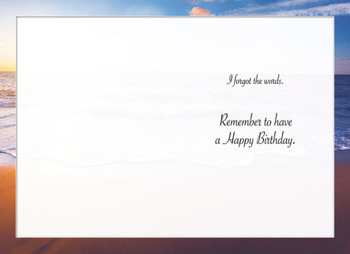 Inside of a humorous birthday card for anyone, showing text 'I forgot the words. Remember to have a Happy Birthday.' against a beach sunset.