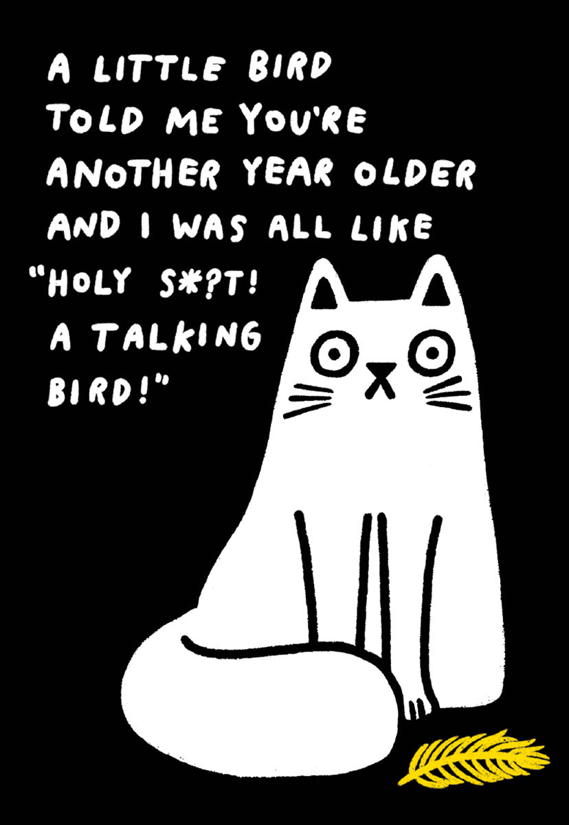 Humorous greeting card with a surprised white cartoon cat on a black background, alongside the witty text 'A little bird told me you're another year older and I was all like "Holy S*!t! A talking bird!"'. Features a small yellow feather.
