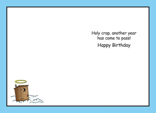 Inside of a humorous birthday greeting card. The white background features black text that reads: "Holy crap, another year has come to pass! Happy Birthday." A small cartoon outhouse with a halo is visible in the bottom left corner, reinforcing the card's witty theme.