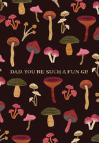 Funny Father's Day greeting card featuring a charming pattern of colorful mushrooms on a dark background with the punny message 'DAD. YOU'RE SUCH A FUN-GI!' in white text.
