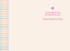 Inside of a cute Valentine's Day greeting card, showing a light cream background with a colorful grid border and text that reads, ''cause there's only one wonderful you! Happy Valentine's Day'.