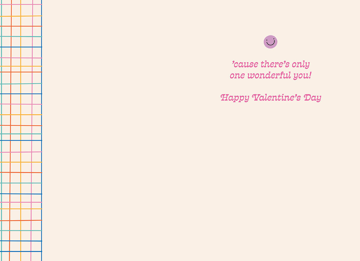 Inside of a cute Valentine's Day greeting card, showing a light cream background with a colorful grid border and text that reads, ''cause there's only one wonderful you! Happy Valentine's Day'.