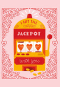 Romantic Valentine's Day greeting card featuring a vintage slot machine illustration with three heart symbols, gold coins, and the text 'I HIT THE JACKPOT WITH YOU' framed by decorative red hearts and swirls on a light pink background.