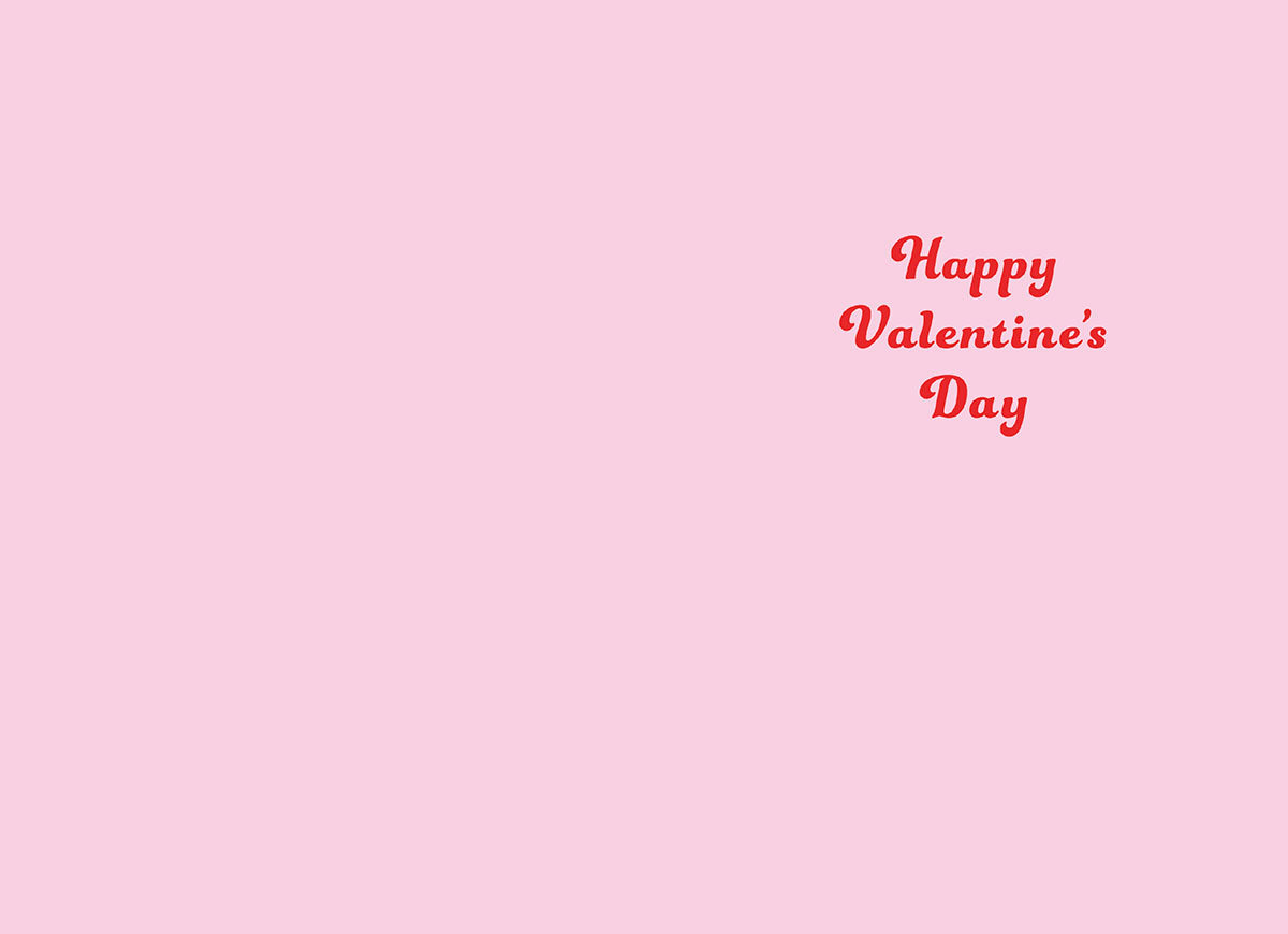 Inside of a light pink greeting card displaying the message 'Happy Valentine's Day' in elegant red script font, with ample blank space for a personalized handwritten message.