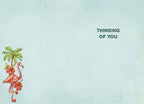 Inside of a lighthearted greeting card showing a small flamingo and palm tree illustration, with the heartfelt message 'THINKING OF YOU' printed on a soft blue background.