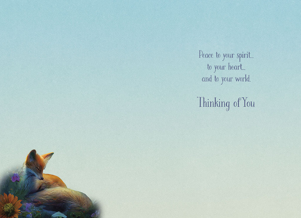 Inside of a 'Thinking of You' greeting card with a soft blue gradient background. Text reads: 'Peace to your spirit... to your heart... and to your world. Thinking of You.' A small sleeping fox and flowers are visible in the bottom left corner.