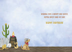 Inside view of a fun greeting card with a light blue sky background, country-themed elements like a cactus and a cowboy dog, featuring the message 'Wishing you a sweet and saucy, extra spicy kind of day! Happy Birthday'.