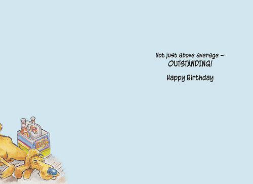 Inside of a funny greeting card with the message 'Not just above average – OUTSTANDING! Happy Birthday' alongside a partial view of a beer case and a dog.