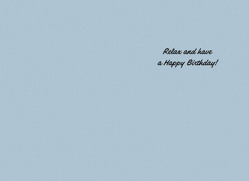 Inside of a light blue greeting card with the message 'Relax and have a Happy Birthday!' in elegant script, for a humorous birthday wish.