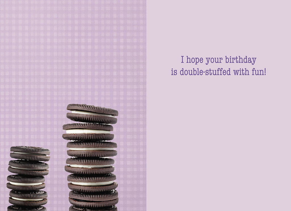 Inside of a light purple gingham greeting card with two stacks of chocolate cream cookies and text: 'I hope your birthday is double-stuffed with fun!'. Ideal for sending sweet wishes to a young one.