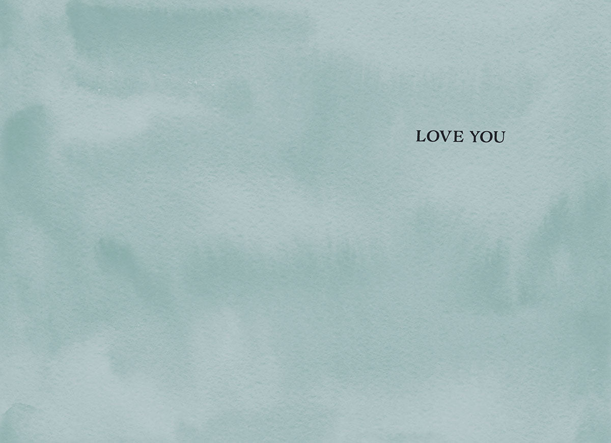 Inside of a greeting card with a soft mint green watercolor background featuring the simple, impactful message 'LOVE YOU' in elegant black font.