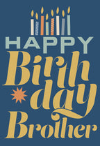 Front of a modern greeting card with a dark blue background featuring 'Happy Birthday Brother' in stylized gold and light blue fonts, accented with colorful birthday candles and a golden star.