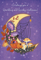 Whimsical Halloween greeting card front with crescent moon, pumpkins, mushrooms, autumn leaves, and a spider on a web against a starry purple sky. Text: 'Wishing you a Sparkling and Spooky Halloween!'