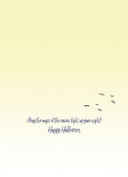 Inside of a cute Halloween card with a warm, gradient yellow background and elegant script that reads 'May the magic of the season light up your night! Happy Halloween.' Small flying birds adorn the bottom right.