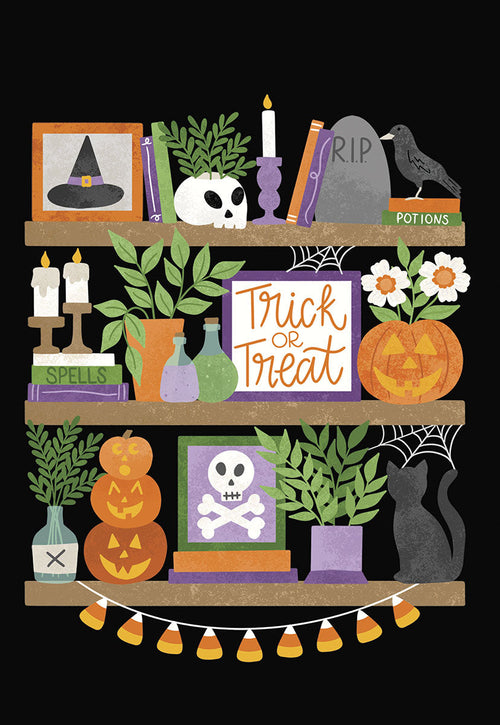 Front of a cute, friendly spooky greeting card featuring a dark bookshelf filled with Halloween decorations: witch's hat, skull, candles, potion bottles, plants, 'Trick or Treat' sign, jack-o'-lanterns, tombstone, raven, black cat, and candy corn garland.