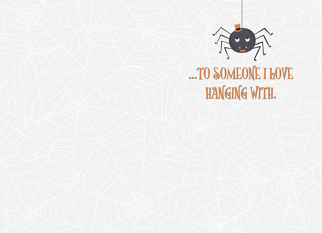 Inside of a cute Halloween greeting card with a small spider and text 'TO SOMEONE I LOVE HANGING WITH.' on a subtle spiderweb background.