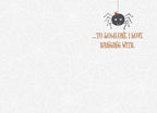 Inside of a cute Halloween greeting card with a small spider and text 'TO SOMEONE I LOVE HANGING WITH.' on a subtle spiderweb background.