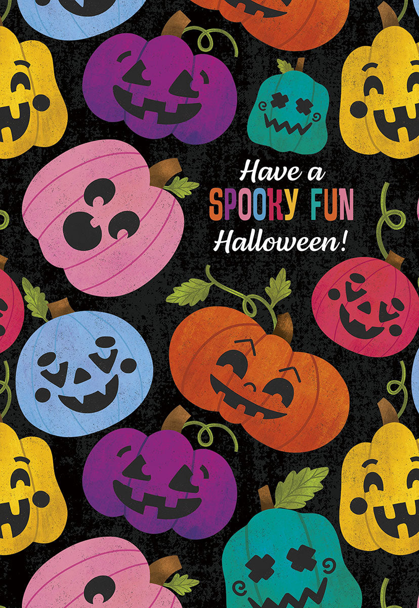 Front of a cheerful, vibrant greeting card featuring a pattern of smiling, colorful jack-o'-lanterns in pink, purple, blue, teal, orange, and yellow on a dark background, with the message 'Have a Spooky Fun Halloween!'