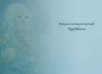 Inside view of a greeting card with a faint, ghostly owl illustration on the left, and elegant text on the right: 'Wishing you an enchanting and magical night! Happy Halloween'. The card has a soft blue background.