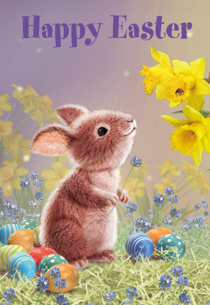 Cute brown bunny looking at yellow daffodils with colorful patterned eggs in spring grass, ideal for an Easter greeting card for kids.