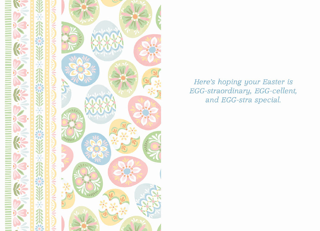 Inside view of a cute Easter card, displaying the message 'Here's hoping your Easter is EGG-straordinary, EGG-cellent, and EGG-stra special.' alongside a pastel egg and floral border.