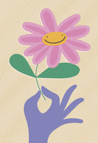 Cute Mother's Day greeting card featuring a smiling pink daisy flower held by a purple hand against a textured beige background, conveying warmth and cheer.