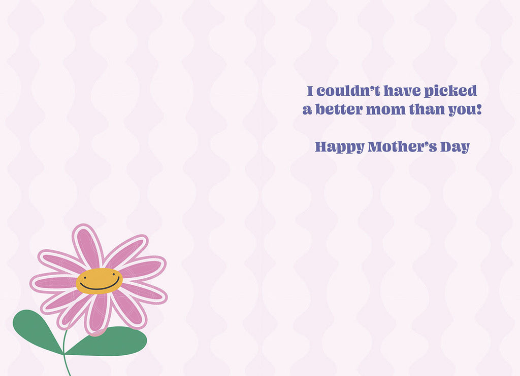 Open Mother's Day card with the heartfelt message 'I couldn't have picked a better mom than you! Happy Mother's Day' in purple text, accompanied by a small pink daisy illustration.