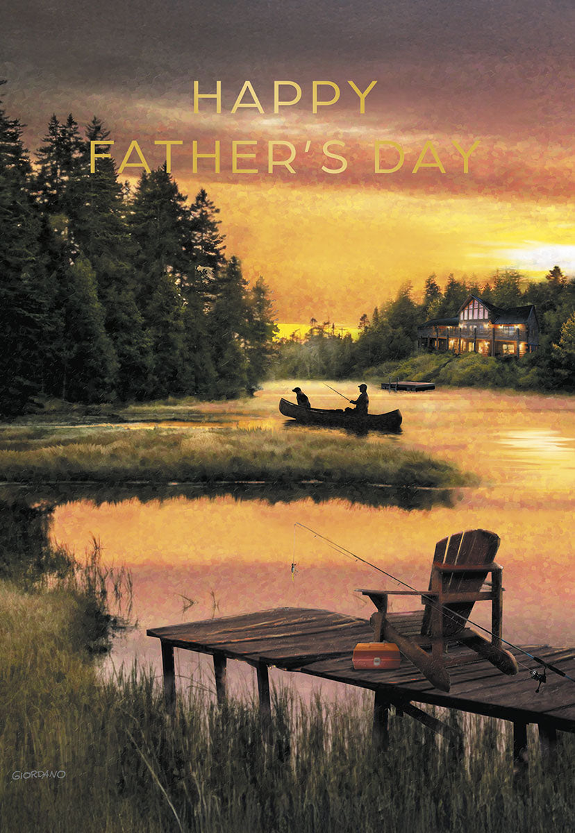 A serene Father's Day card showing a man and his dog fishing from a canoe on a calm lake at sunset, with a rustic cabin and pine trees.