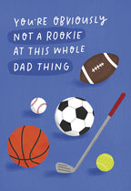 Funny Father's Day greeting card featuring various sports balls (football, basketball, soccer, baseball, golf, tennis) on a blue background with the witty text 'You're obviously not a rookie at this whole Dad thing.' Ideal for a sports-loving father or father figure.