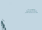 Inside of a Father's Day greeting card on a light blue background with 'I'm so grateful for the journey we've shared and the memories we've made' text and subtle pine tree illustrations in the bottom left.