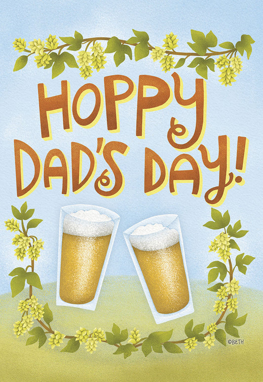 Front of 'Hoppy Dad's Day' greeting card. Features two frothy beer glasses, green hop vine border, and light blue sky background.