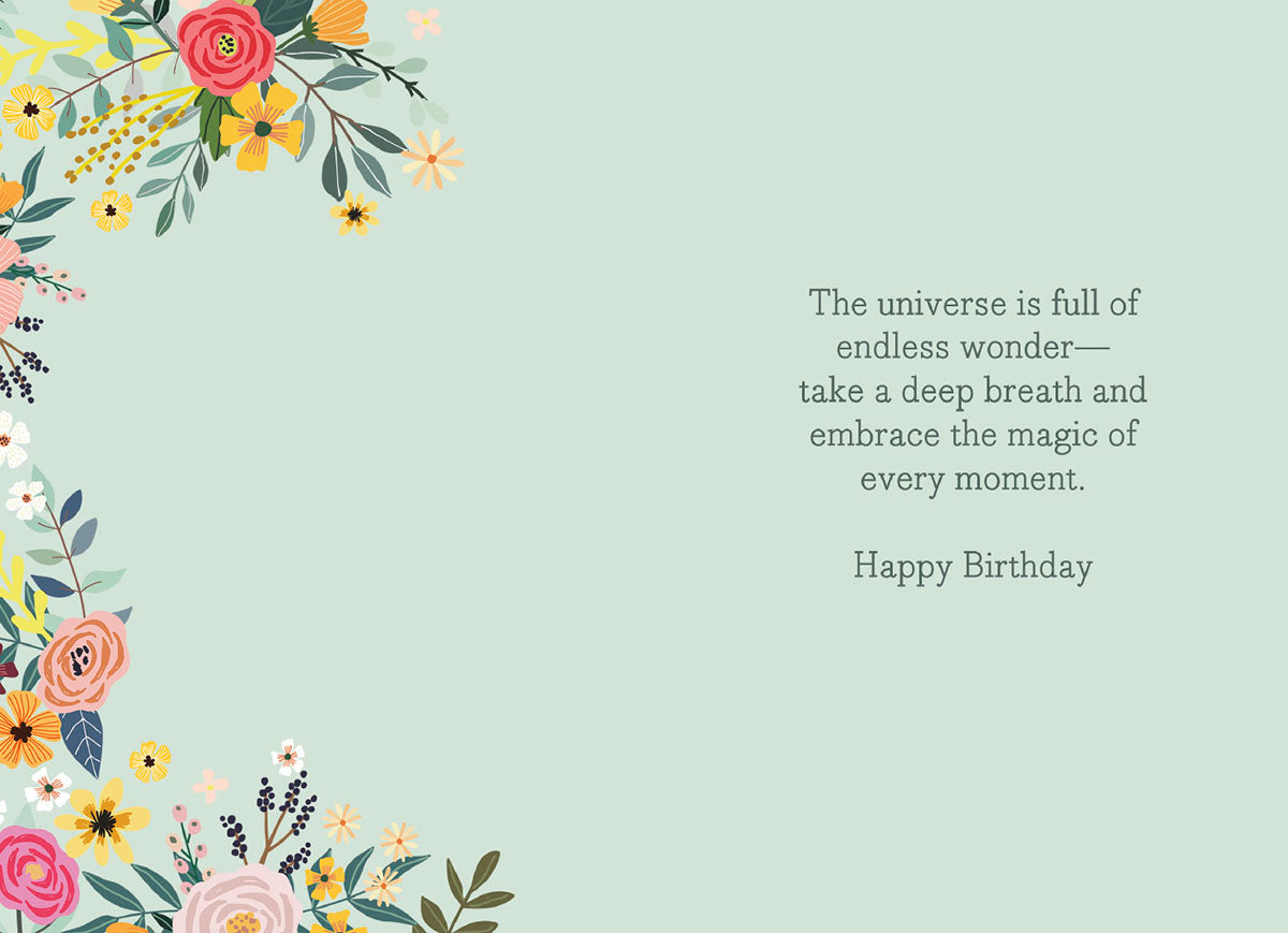 Inside of a Mia Charro 'Carpe Diem' card, with a mint green background and an encouraging message about wonder.