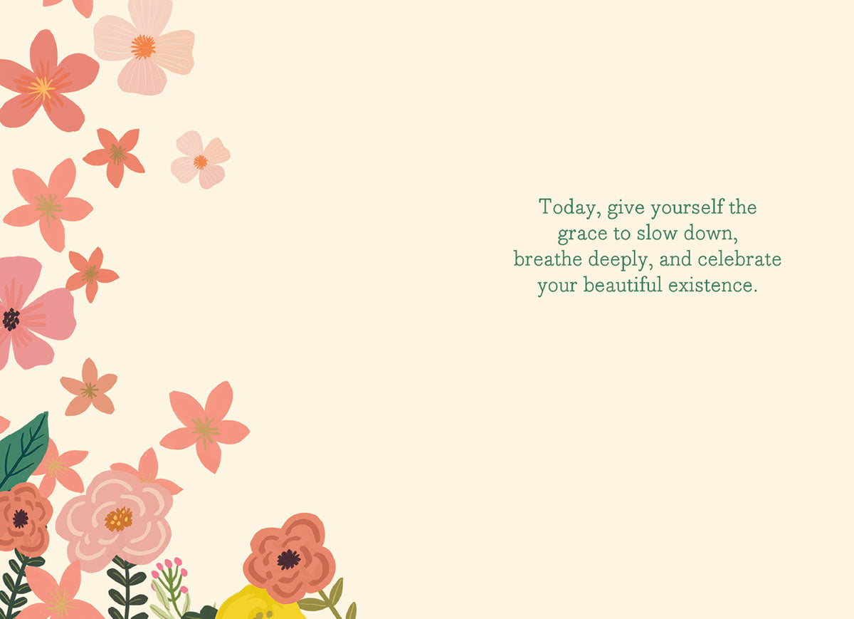 Inside of a Mia Charro 'Happy Birthday' card, with a cream background and a message about celebrating existence.