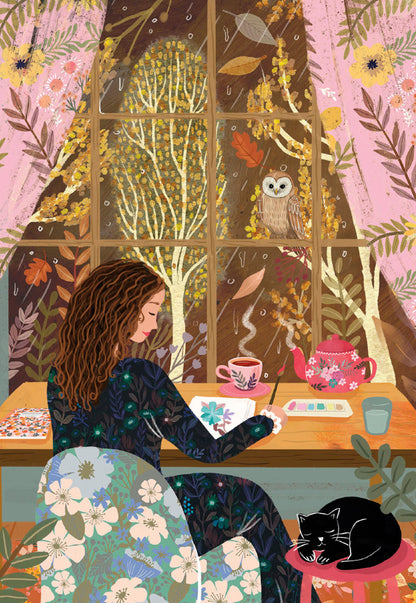 Front of a Mia Charro card depicting a woman painting at a desk with a cat, surrounded by autumnal window view.