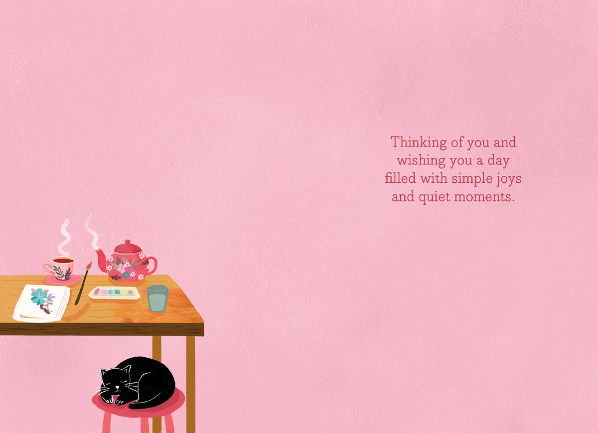 Inside of a Mia Charro card with a pink background and a message about simple joys and quiet moments.