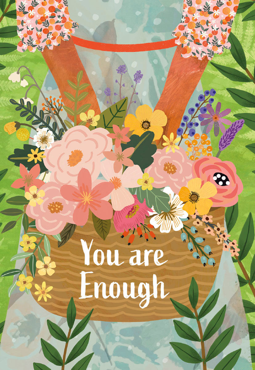 Front of a Mia Charro 'You Are Enough' card, featuring a woman holding a basket brimming with flowers.