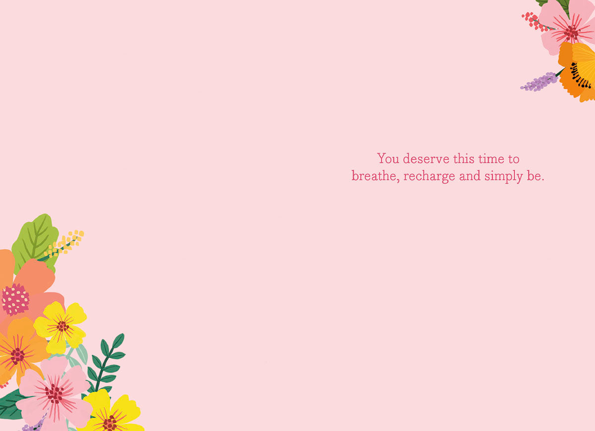 Inside of a Mia Charro 'Give Yourself Permission To Rest' card, with a pink background and a message about recharging.