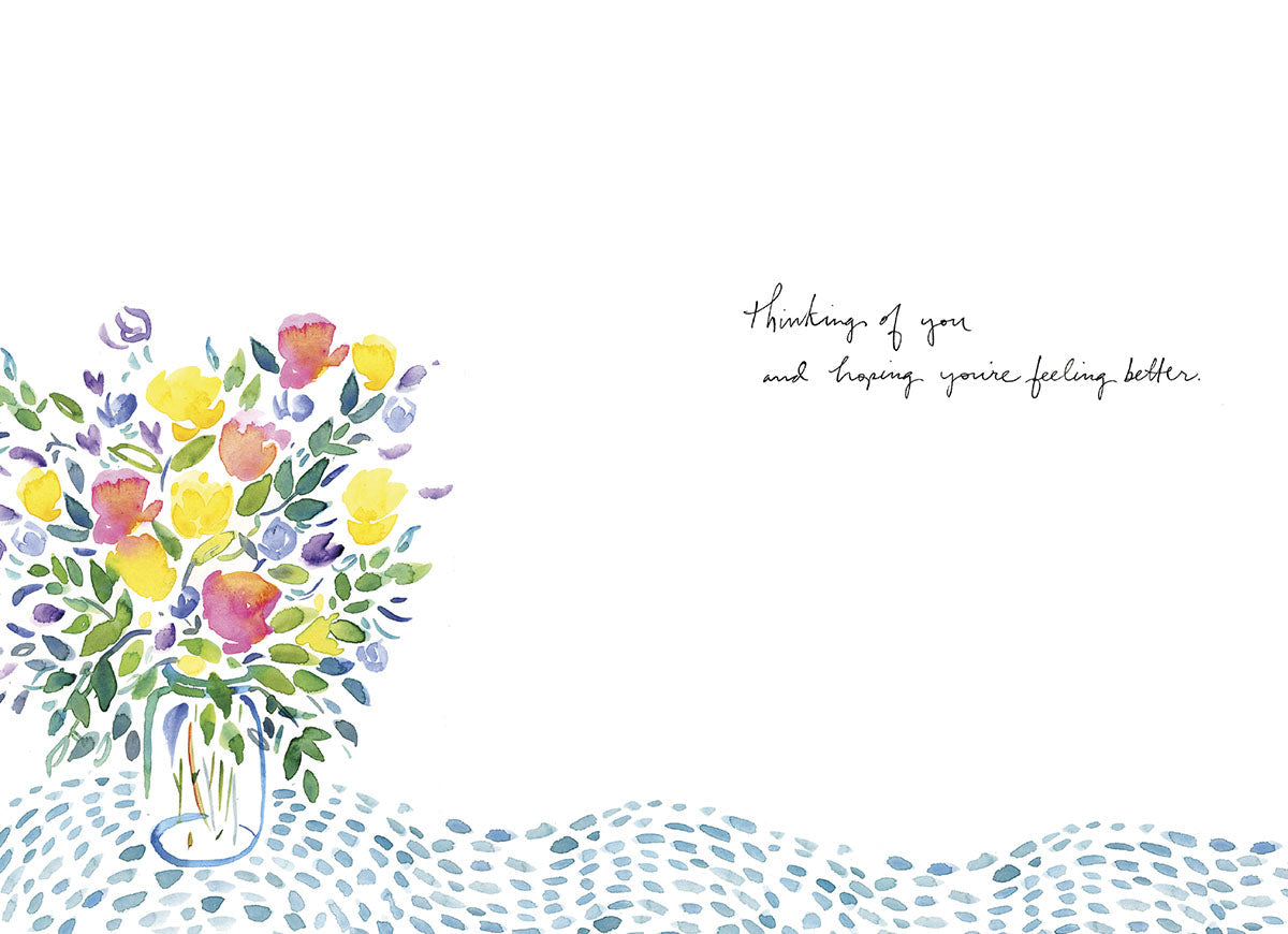 Inside of the flower bouquet card, expressing care: 'Thinking of you and hoping you're feeling better.' with a patterned border.