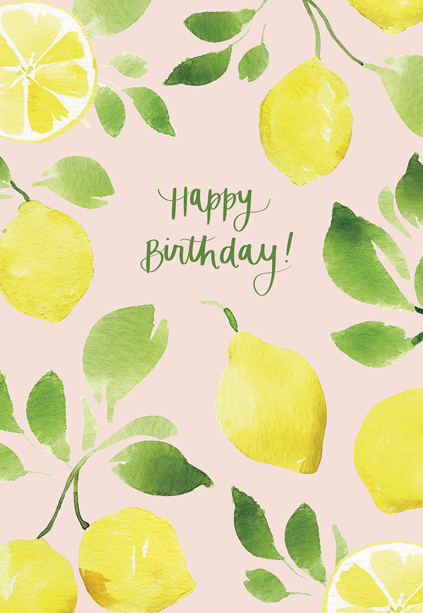 "Happy Birthday!" greeting card with a pattern of watercolor lemons and green leaves on a soft pink background.