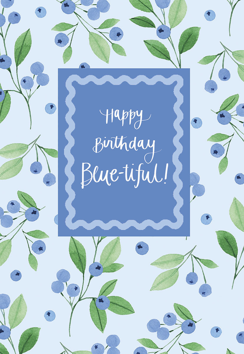 "Happy Birthday Blue-tiful!" greeting card with a decorative frame of watercolor blueberries and green leaves.