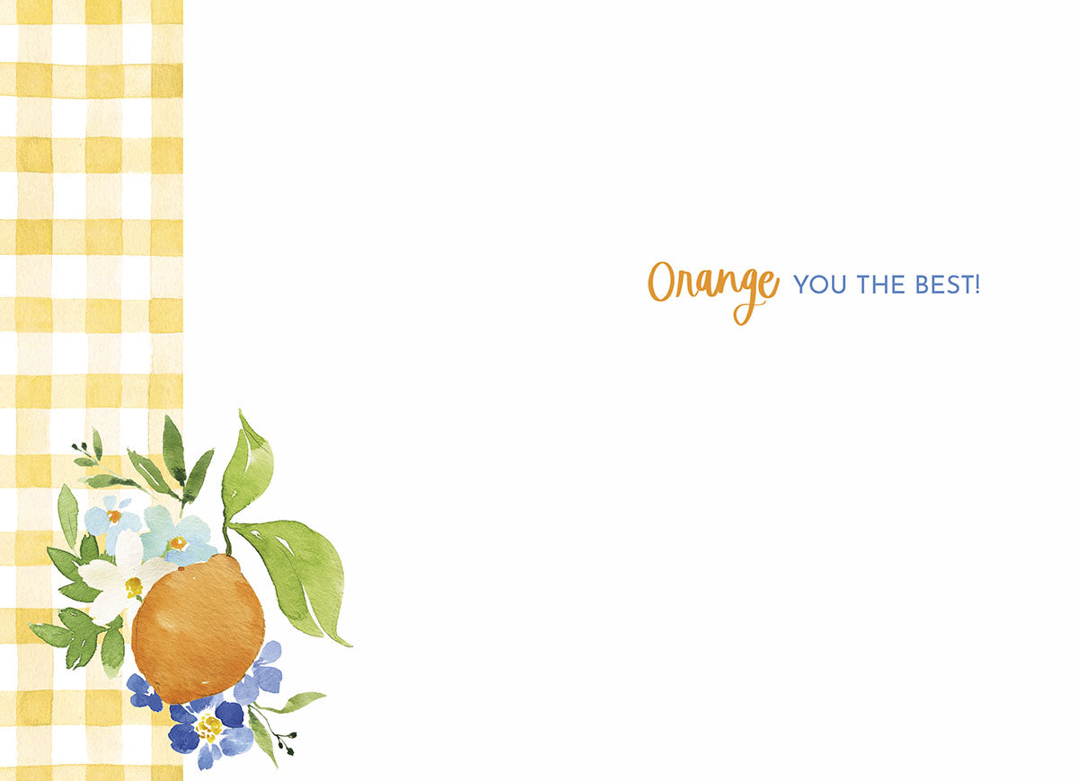 Inside of the orange card with "Orange you the best!" text and a watercolor orange and flower design in the corner.