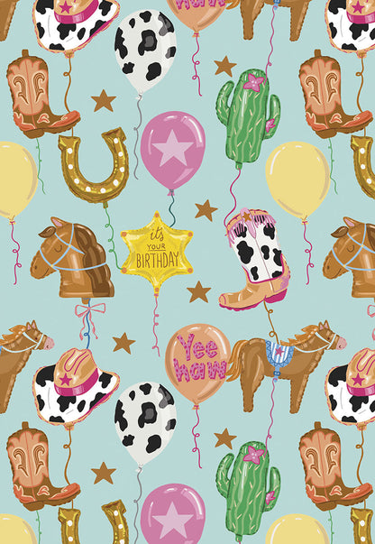 Front of a "Giddy Up and Have a Happy Day!" birthday card with Western balloons, boots, horses, and cacti.