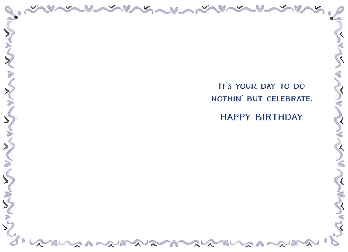 Inside of the bandana pattern card, with a decorative border, text: "IT'S YOUR DAY TO DO NOTHIN' BUT CELEBRATE. HAPPY BIRTHDAY".