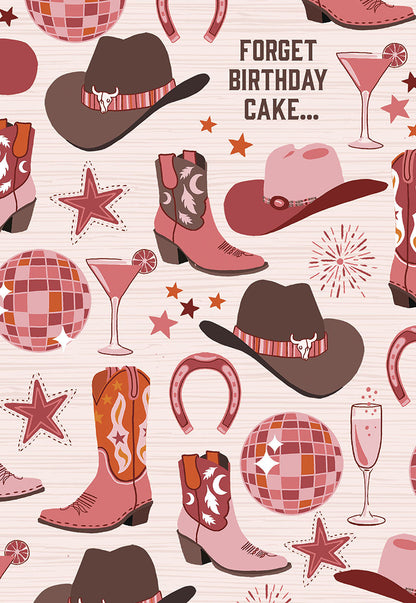 Front of a birthday card with cowboy hats, boots, horseshoes, disco balls, and cocktails, text "FORGET BIRTHDAY CAKE..."